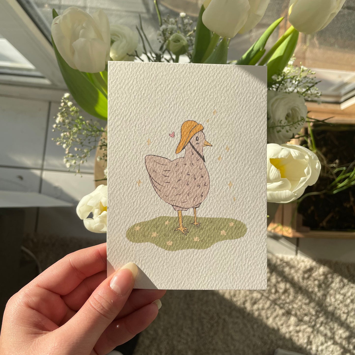 Chicken with rain hat postcard